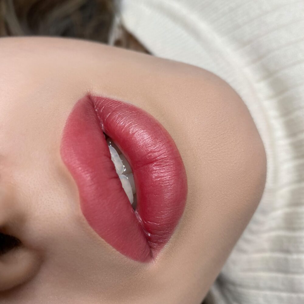 Close-up of lips and sweater