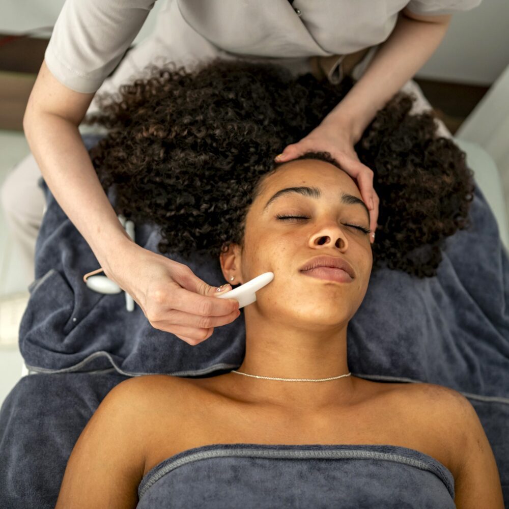 Woman receiving skincare treatment