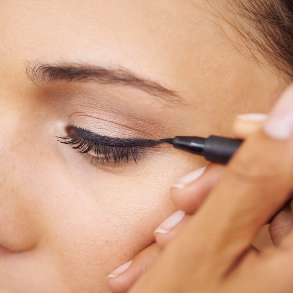 Close-up of eyeliner application process