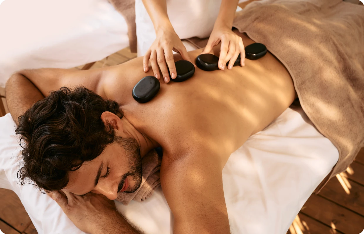 Person enjoying back massage therapy