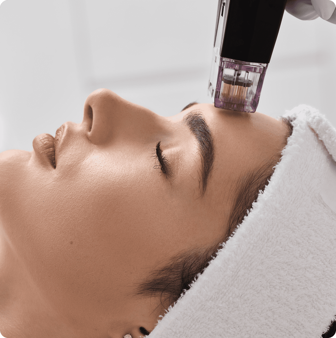 Woman receiving skincare treatment